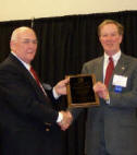 Mark Flynn presents award to Robert Lund