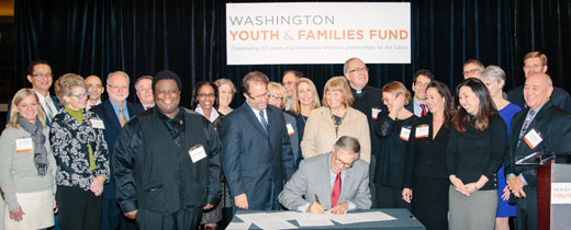 Governor Inslee signing and group
